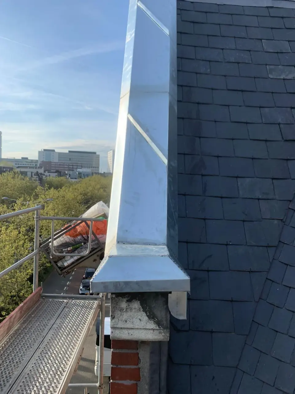 Decorative slate patterns, metal surrounds and masonry connections.