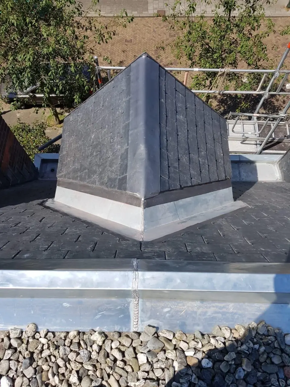Decorative slate patterns, metal surrounds and masonry connections.